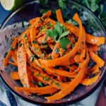 The Best Carrot Ribbon Salad 5 Fresh carrot ribbon salad garnished with parsley in a glass bowl