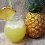 How to Make Agua de Piña (Pineapple Agua Fresca) 6 Refreshing Agua de Piña - pineapple water with lime and mint served cold