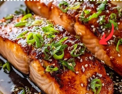 Baked teriyaki salmon served with steamed vegetables on a plate
