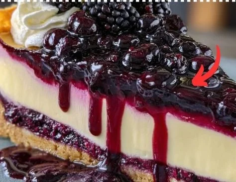 Delicious Blueberry Bliss Cheesecake with fresh blueberries on top