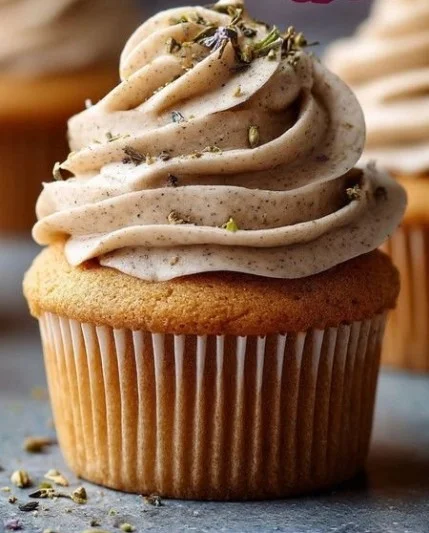 Delicious chai latte cupcakes topped with creamy frosting and sprinkled with spices