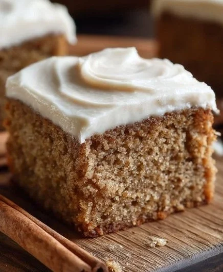 Deliciously baked Moist Spice Cake decorated with autumn spices.