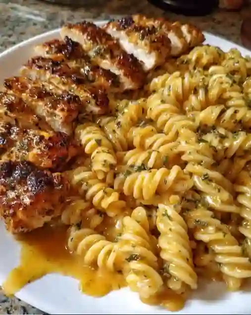 Perfect Garlic Butter Chicken Rotini in Cheesy Three-Cheese Parmesan Sauce Recipe: Creamy, Garlicky Pasta Main 1 Garlic Butter Chicken Rotini in Cheesy Three-Cheese Parmesan Sauce